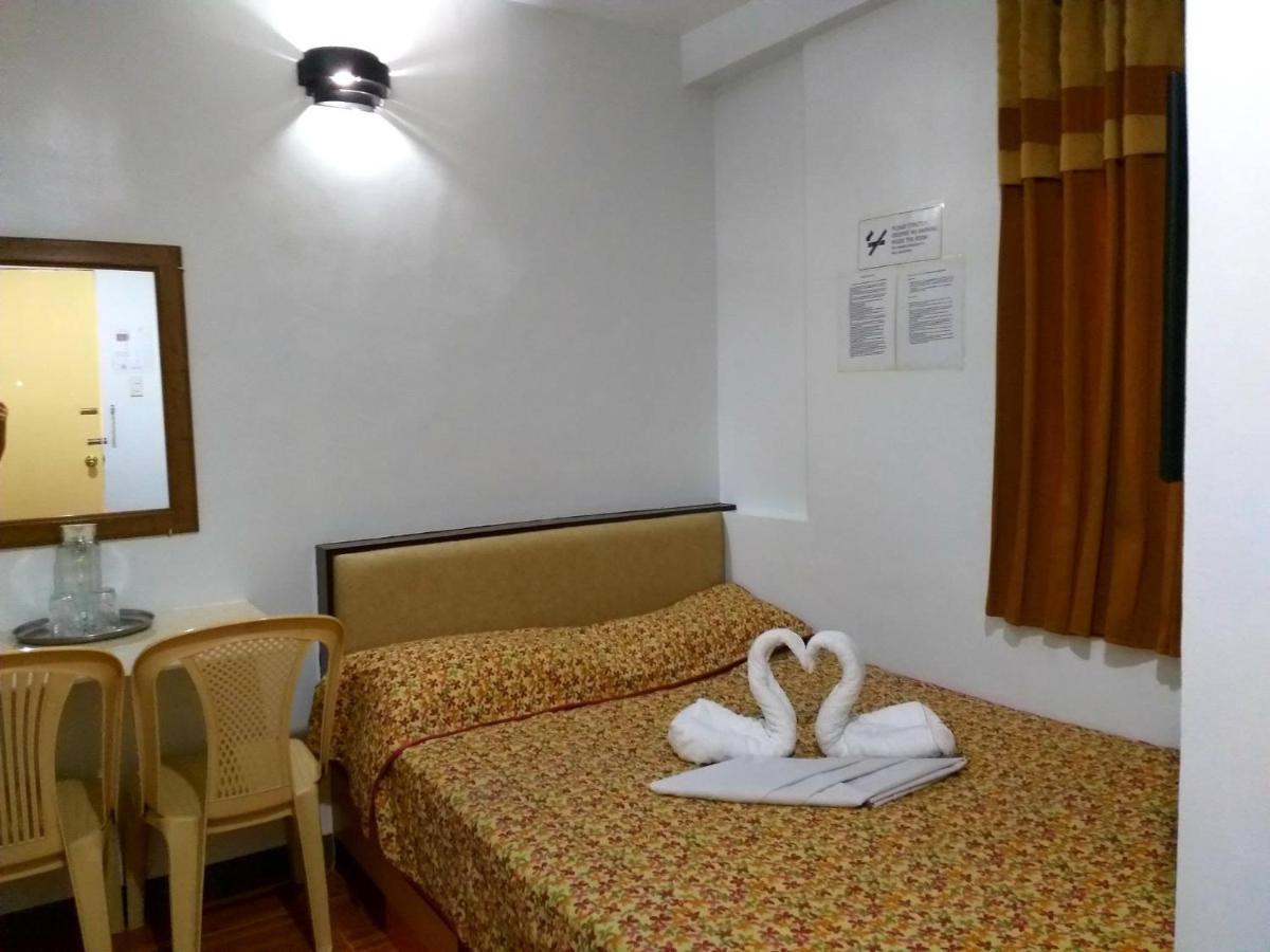 Sola Eleganza Apartelle เกซอนซิตี้ ภายนอก รูปภาพ